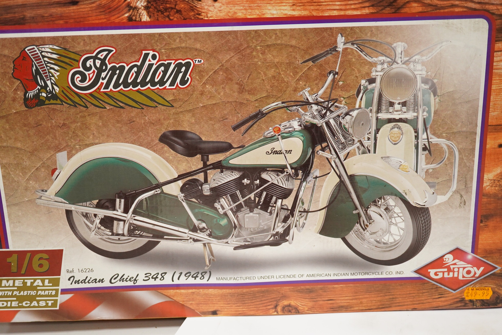 Four boxed diecast motorcycles by Franklin Mint, Guitoy, etc.; a Guitoy 1:6 scale model of an Indian Chief 348 (1948), a 1:6 scale Harley Davidson 1917 bike in military drab, a 1:24 scale Harley Davidson 1936 ‘45’ ES and